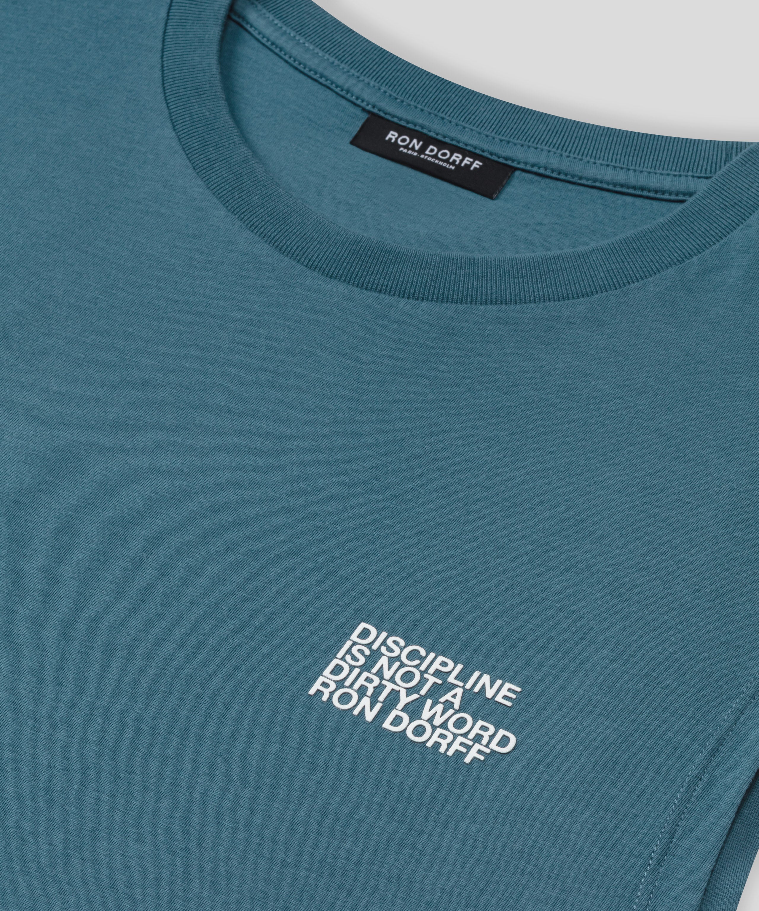 Organic Cotton Sleeveless T-Shirt "DISCIPLINE": Baltic Blue